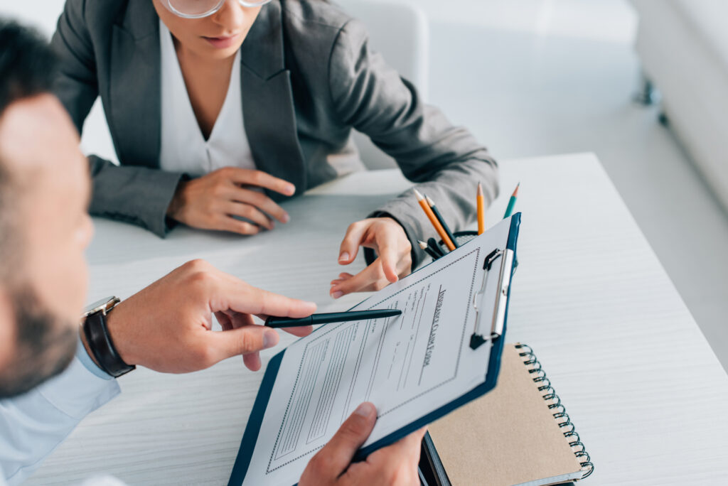Client discussing benefits at an Indiana Health Insurance Agency