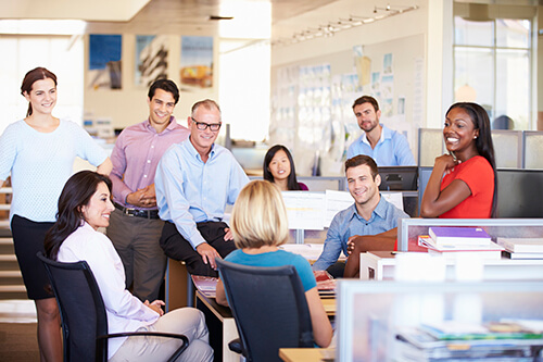 Employees discussing Employee Assistance Program